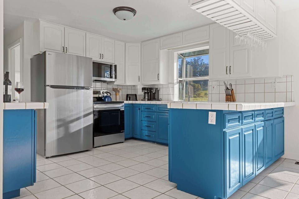 Modern kitchen update with sleek new appliances and an induction stove—perfect for cooking up local finds from the Sonoma markets.