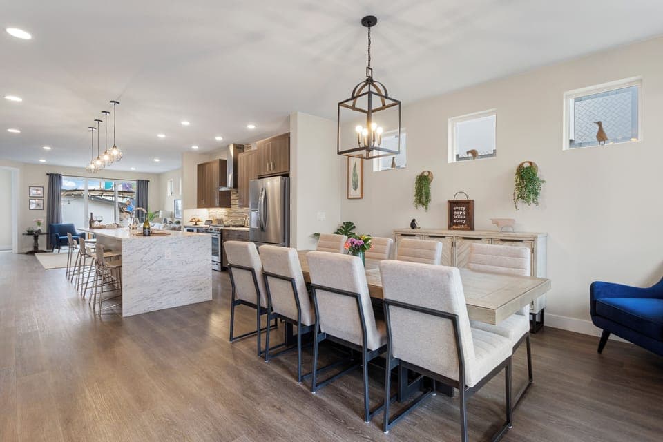 Gather around this inviting dining space where you'll share memorable meals with loved ones in elegant comfort.