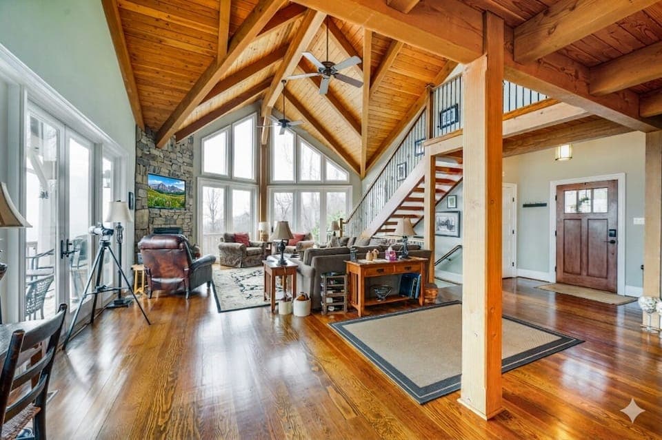 Spacious Living Room: Bask in natural light and enjoy the stunning views from tall windows!