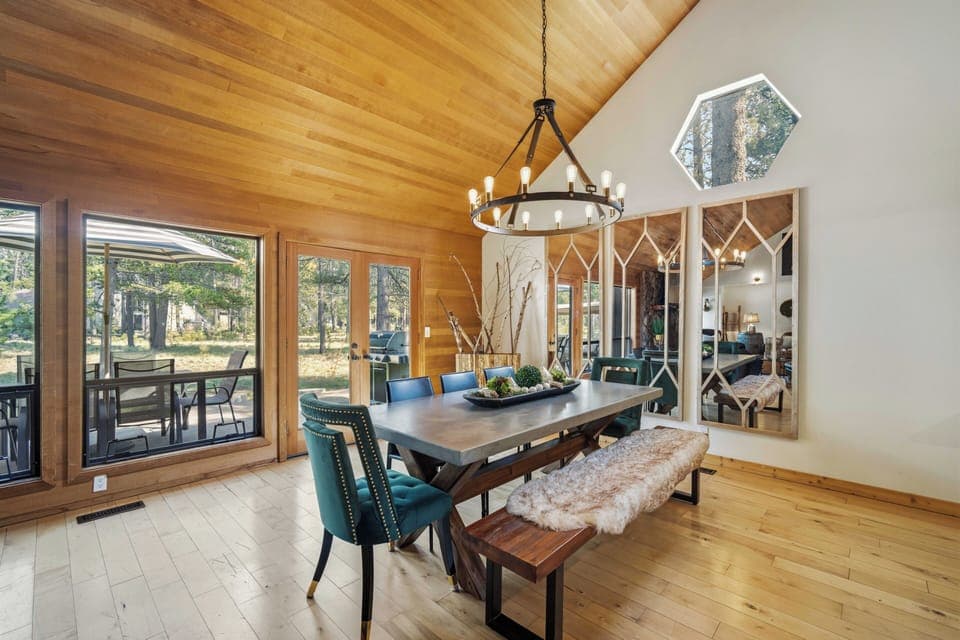 Gather around this stunning dining table where warm wood meets modern elegance, perfect for memorable meals with loved ones.