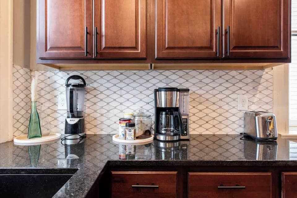 Kitchen: Bright and functional kitchen featuring updated appliances, generous counter space, and all the essentials you need. Ideal for cooking, dining, or enjoying a relaxed breakfast before heading out.