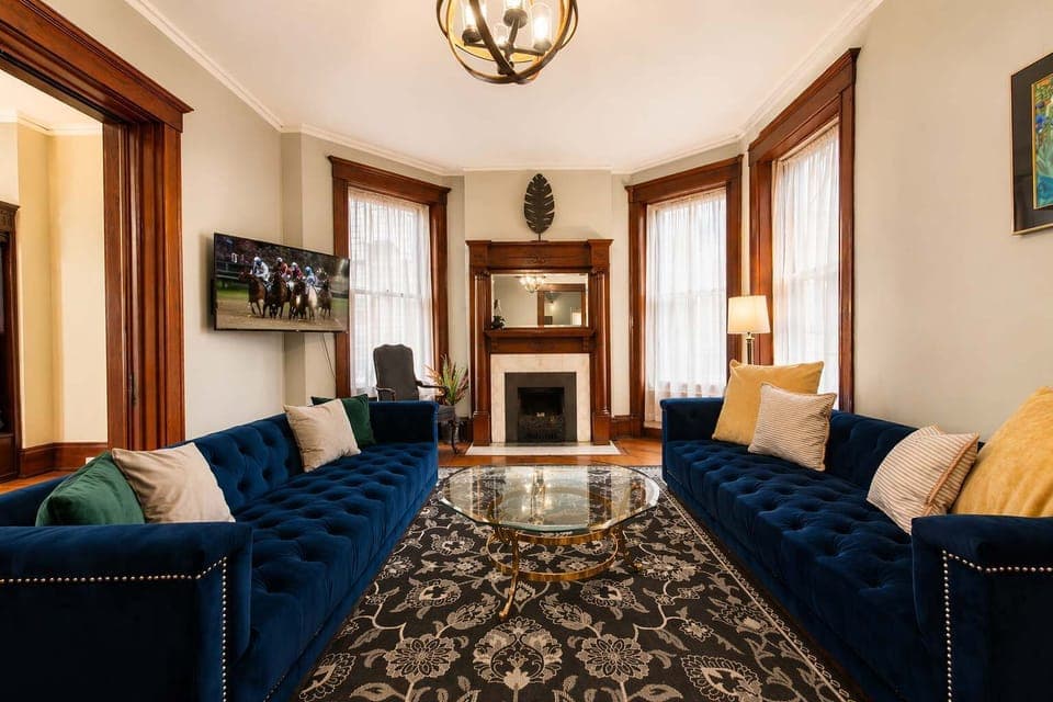 Living Room: Relax in this cozy living room featuring a comfortable sofa, soft lighting, and a warm, inviting atmosphere. Perfect for unwinding after a long day, enjoying movie nights, or simply lounging in comfort.