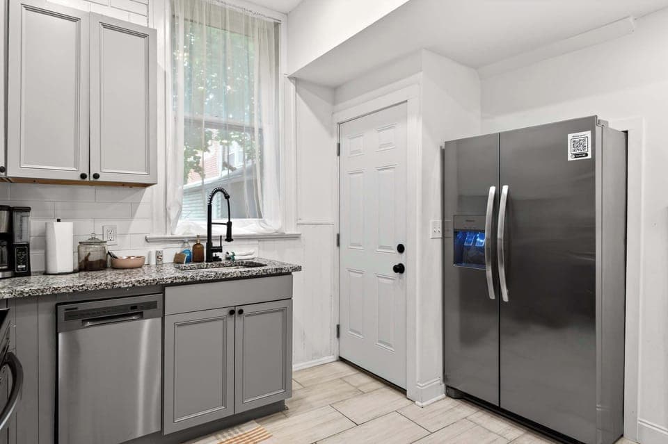 Kitchen: Fully loaded, fully stocked, fully ready for whoever's pretending to be the group chef.