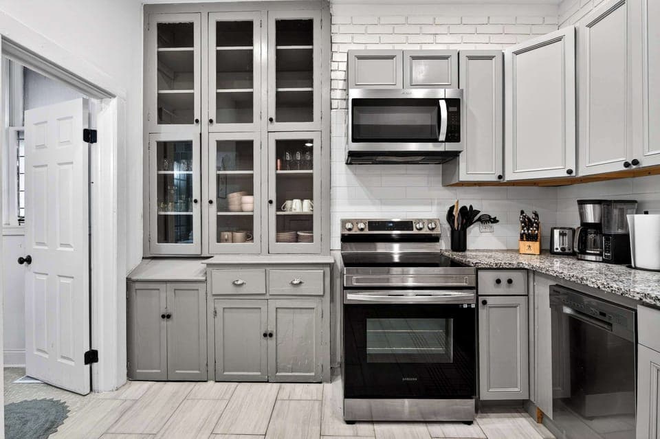 Kitchen: Fully loaded, fully stocked, fully ready for whoever's pretending to be the group chef.