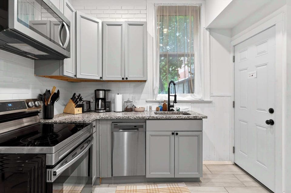 Kitchen: Fully loaded, fully stocked, fully ready for whoever's pretending to be the group chef.