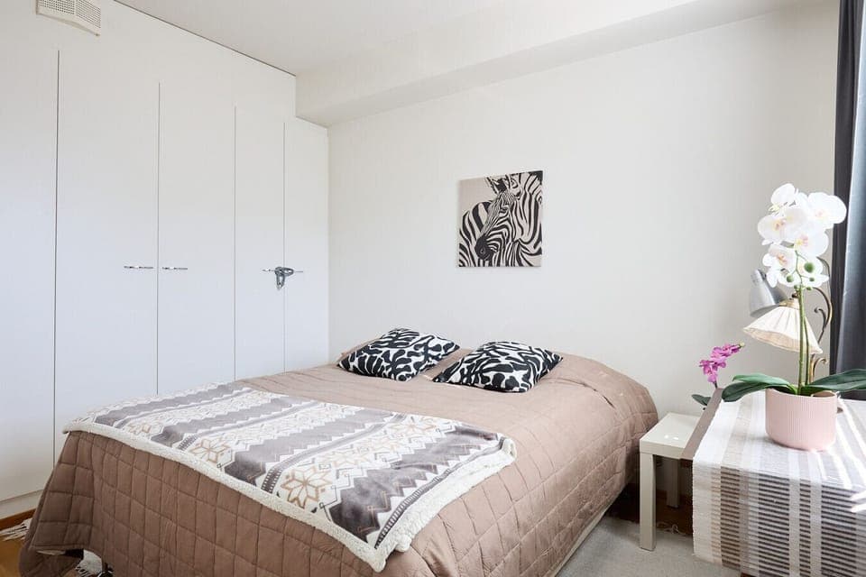 Enjoy a restful night`s sleep on a high-quality mattress featuring fresh linens and ample bedside space for your personal items. The large built-in wardrobes offer plenty of storage for long-term stays.