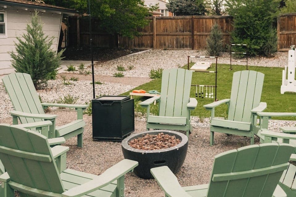 Fire pit lounge with Adirondack seating.