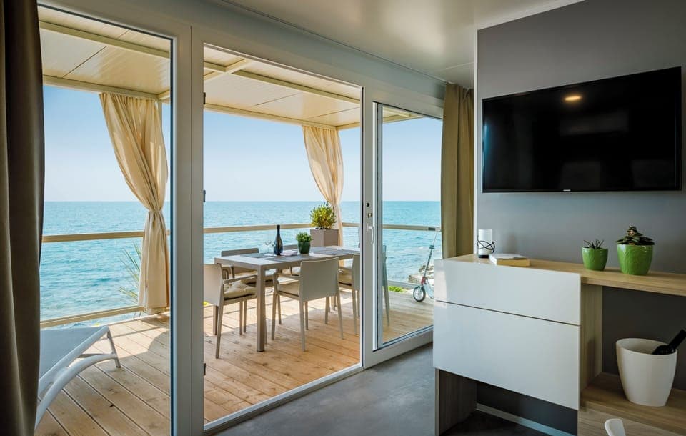 Amber Sea Luxury Village - Sea Holiday Home | Living area | 81-inch LCD TV with cable channels, TV, table tennis