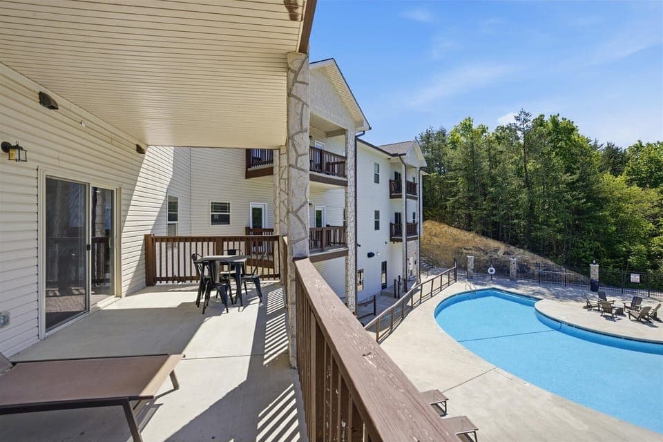 Set the table, bring your plate out, and let meals feel a little slower here. With more room to spread out, this porch turns into its own hangout spot without needing anything else. With views of the mountains and the pool, you can't beat it!