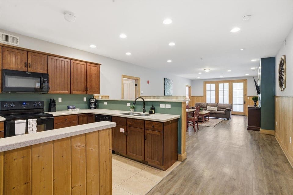 Step inside unit 711's easy single-level entry and take it all in—the entry opens straight into a bright, open living space, giving you that instant “this is the place” feeling as soon as you walk through the door.