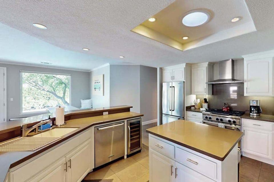 Ample counter space and a professional-grade range with hood make it easy to prepare farm-to-table meals with fresh Sonoma Valley produce.
