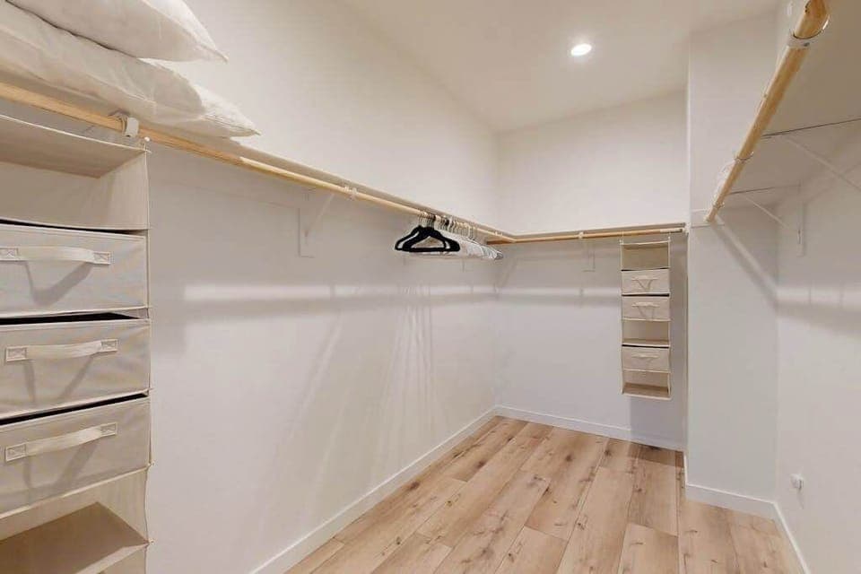 Settle into your oversized walk-in closet with built-in shelving and drawers — plenty of room to unpack for a long Sonoma Valley wine retreat.