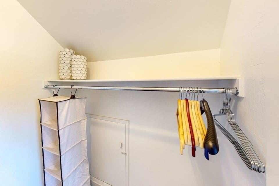 Hang your vineyard-hopping outfits in this tidy closet with a full rod, shelf storage, and organizer — everything in its place for your Sonoma stay.