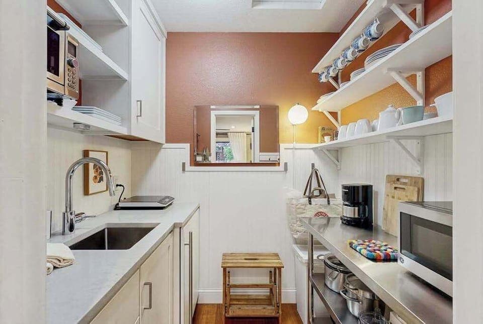 Brew your morning coffee in your well-equipped kitchenette — a microwave, toaster, mini fridge, and wine glasses on the rack mean you can enjoy Sonoma's local cheeses and wines anytime.