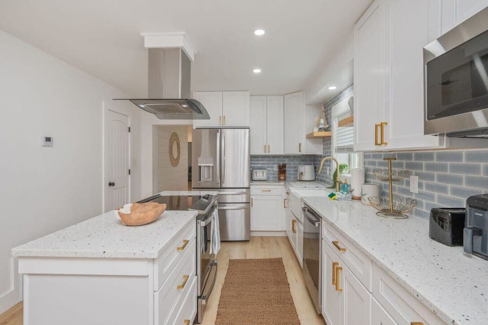 Enjoy a clean and spacious kitchen perfect for preparing meals at home.