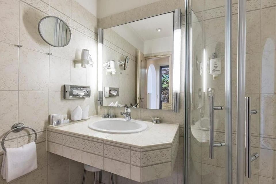 Family Suite, Balcony, Lake View | Bathroom | Bathrobes, slippers