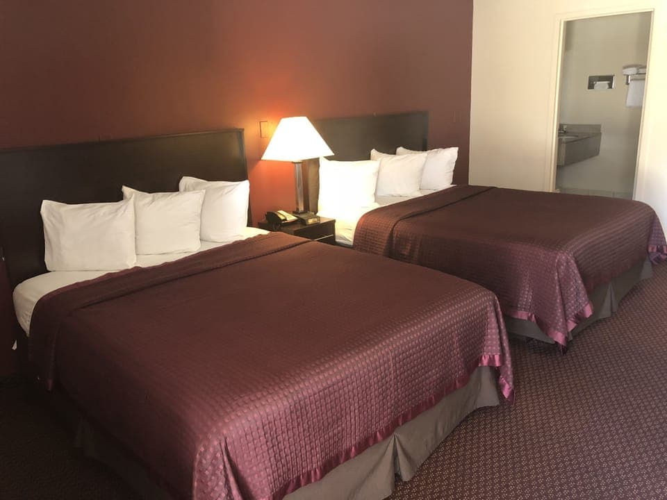 Deluxe Room, 2 Queen Beds | Desk, blackout drapes, soundproofing, iron/ironing board