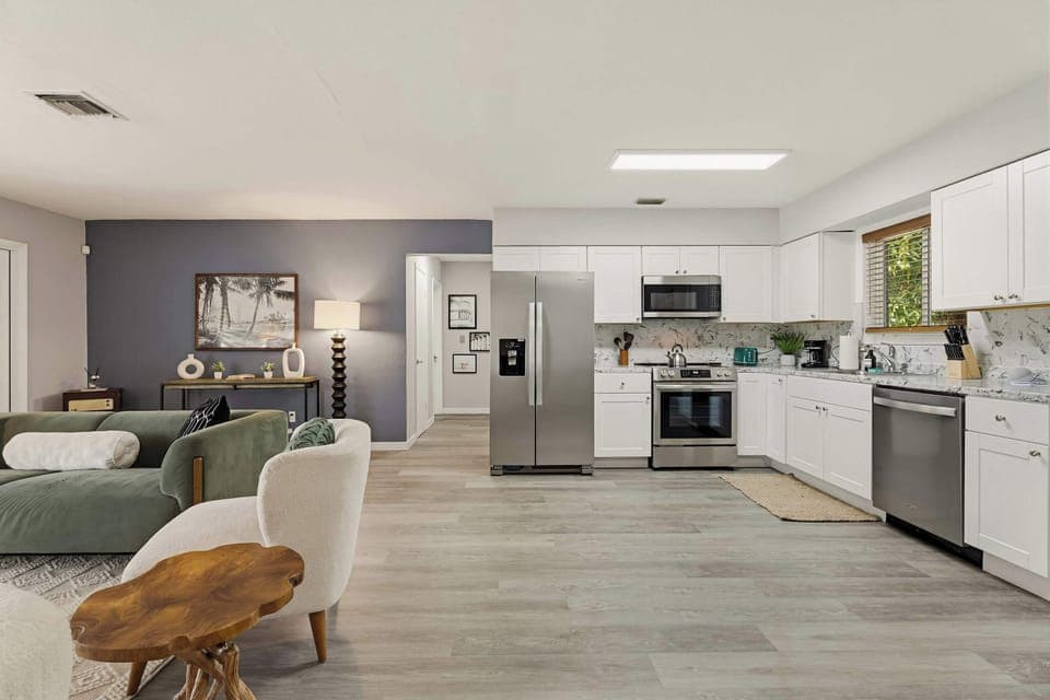 Enjoy a social atmosphere where the kitchen meets the living room.