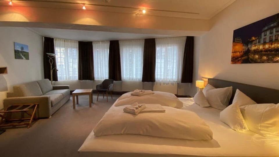 Superior Double Room | Living room | Flat-screen TV