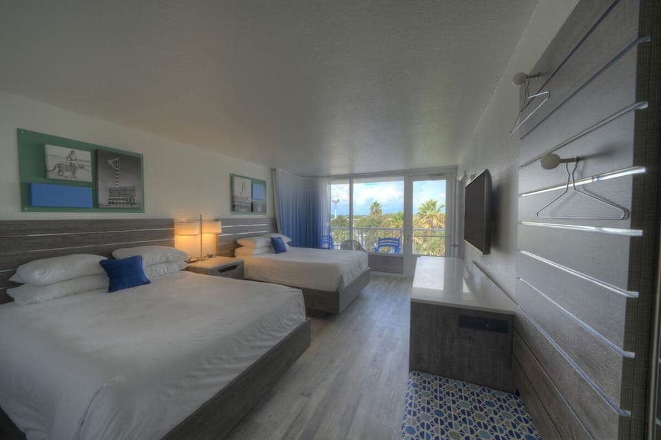 Unwind in crisp coastal beds with calming, airy décor.