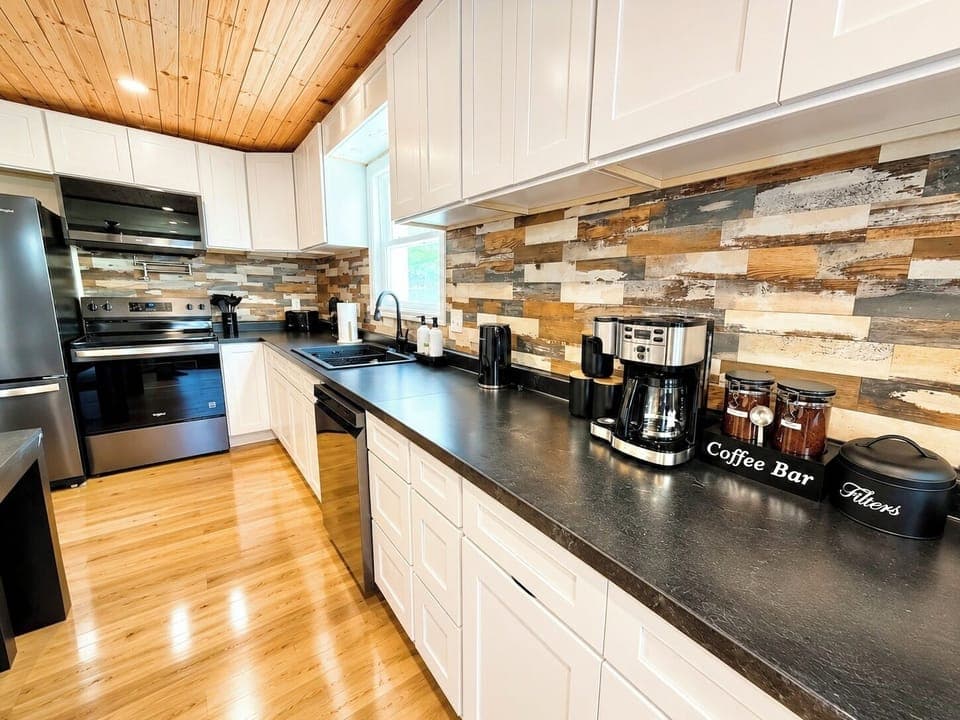 ully stocked and thoughtfully designed, this stylish kitchen makes everything from morning coffee to family dinners feel easy and inviting.
