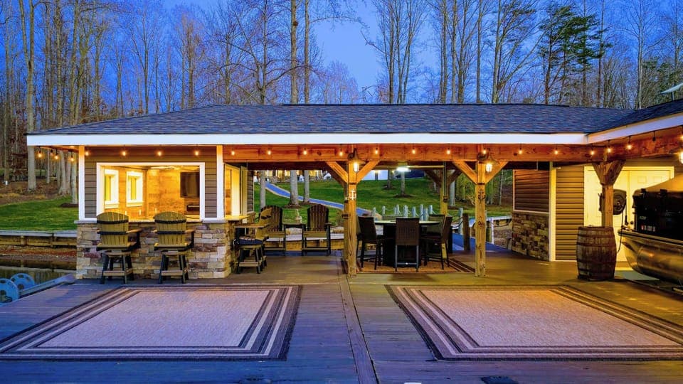 Backyard - A long sloped lawn runs from the house down to the dock and waterfront, plenty of room to spread out along the way.