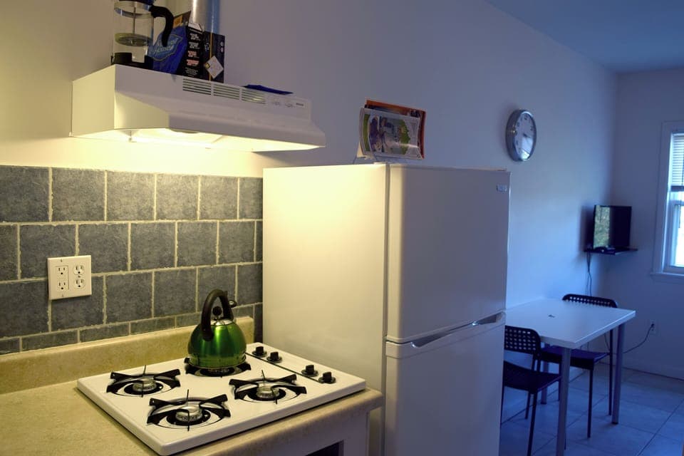 Fridge, microwave, stovetop, coffee/tea maker