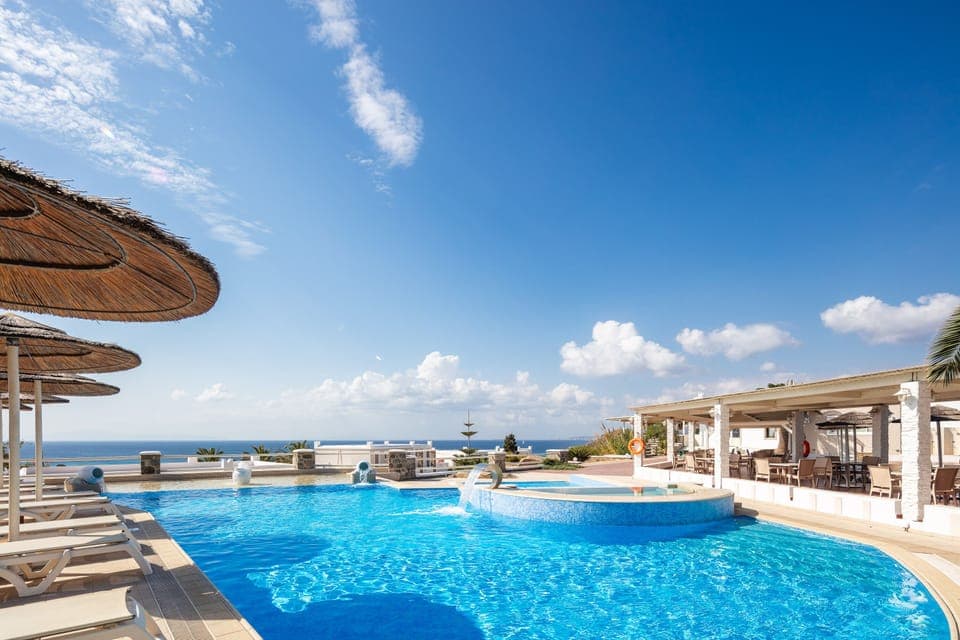 Seasonal outdoor pool, pool umbrellas, sun loungers