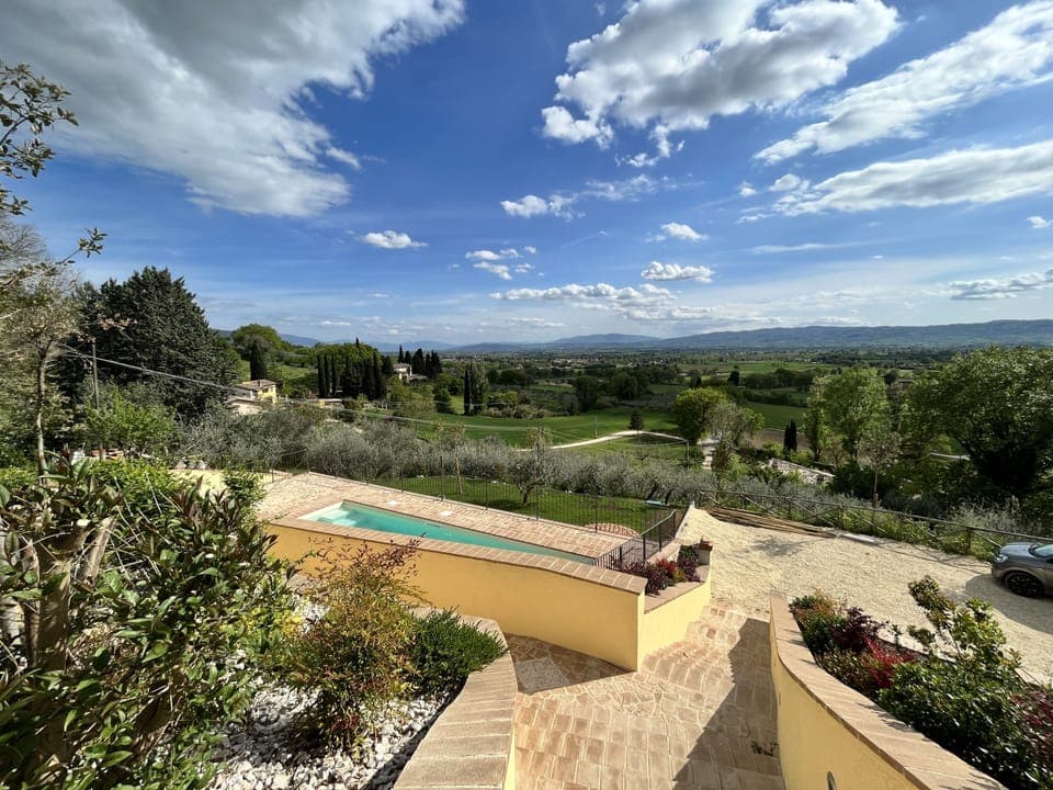 Seasonal outdoor pool, open 8:30 AM to 8:30 PM, pool umbrellas