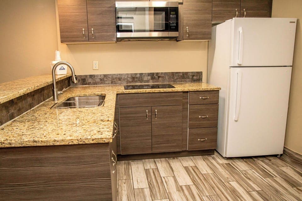 Deluxe Suite, 1 Bedroom, Non Smoking (Efficiency, 2 Queen Beds) | Private kitchen | Mini-fridge, microwave, coffee/tea maker