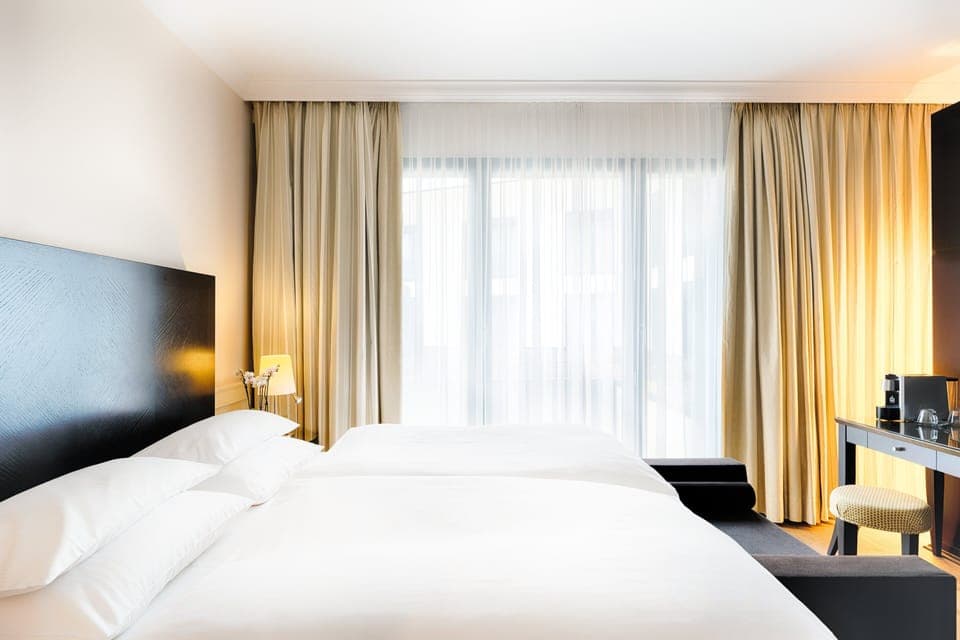 Hypo-allergenic bedding, in-room safe, desk, laptop workspace