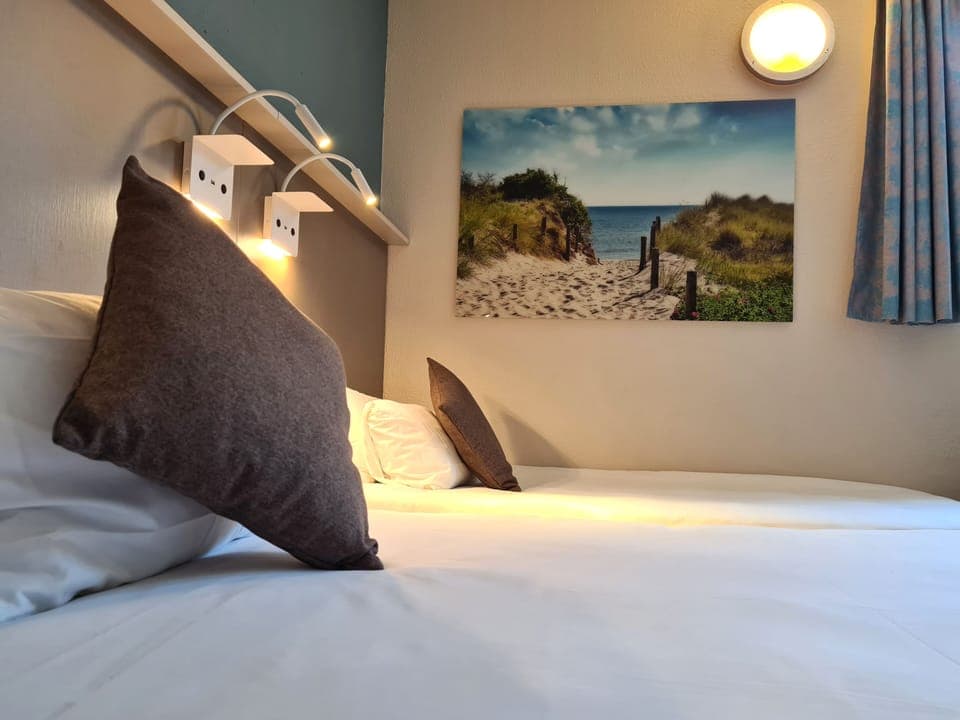 Premium bedding, desk, soundproofing, iron/ironing board