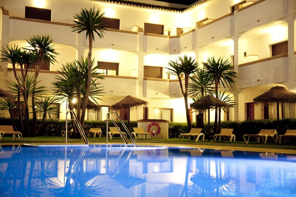 Outdoor pool, open 10:00 AM to 8:00 PM, pool umbrellas, sun loungers