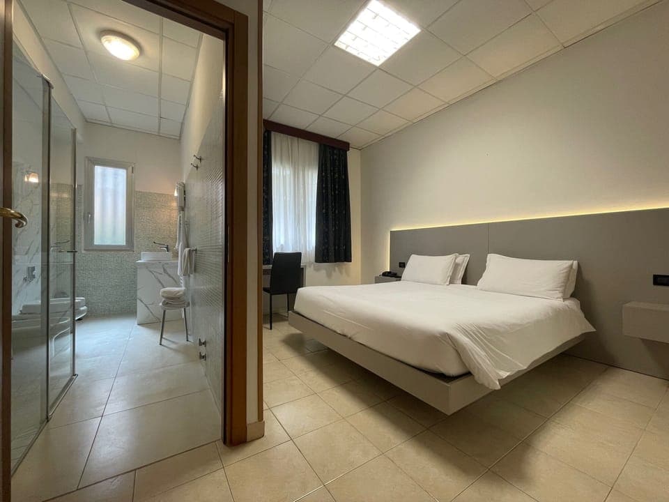 Down comforters, minibar, in-room safe, blackout drapes