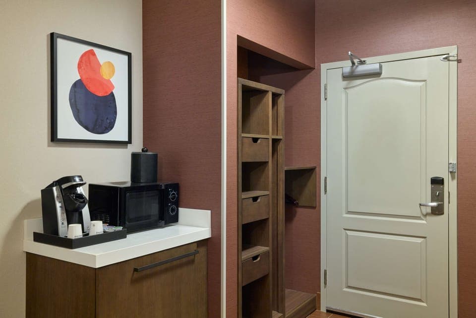 Desk, laptop workspace, blackout drapes, iron/ironing board