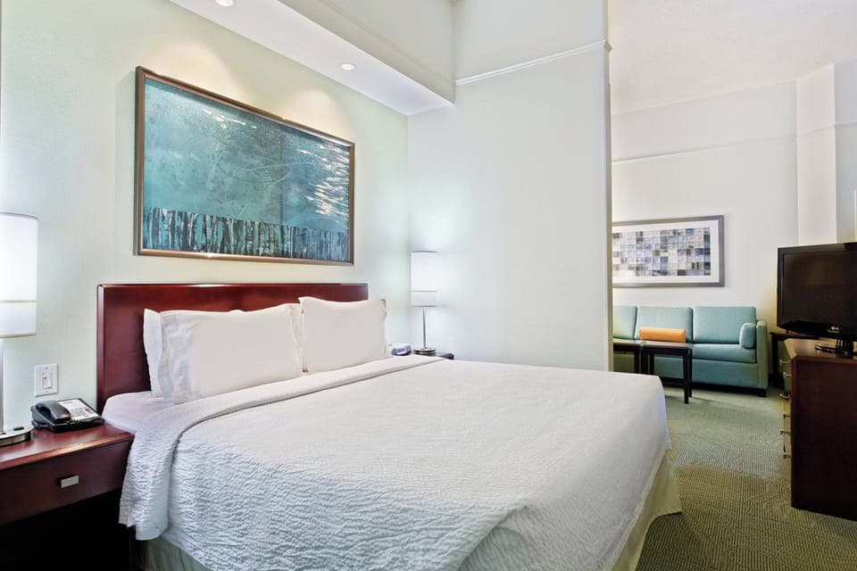 Premium bedding, desk, blackout drapes, iron/ironing board