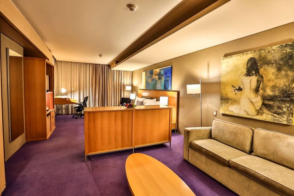 Junior Suite, 1 King Bed | Premium bedding, in-room safe, desk, blackout drapes