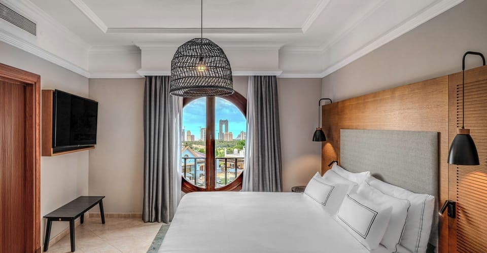 Hypo-allergenic bedding, down comforters, minibar, in-room safe