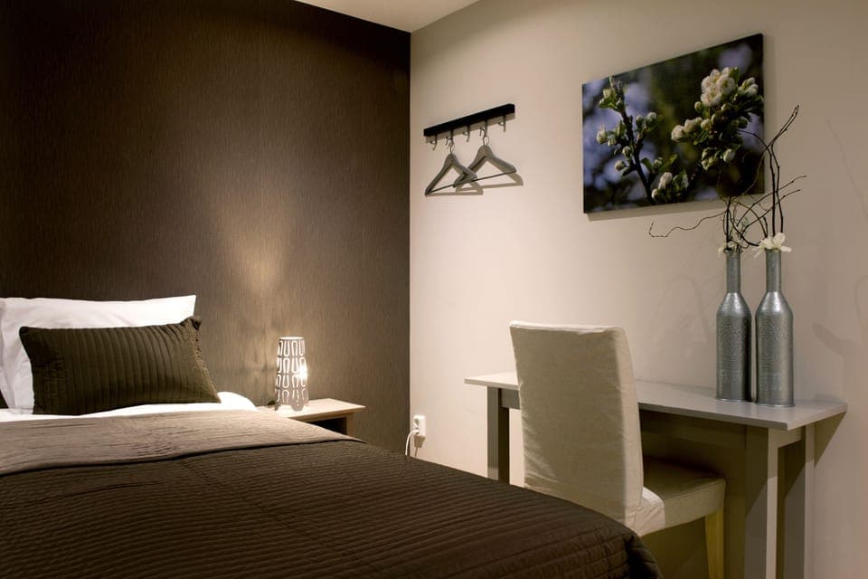 Premium bedding, desk, soundproofing, iron/ironing board