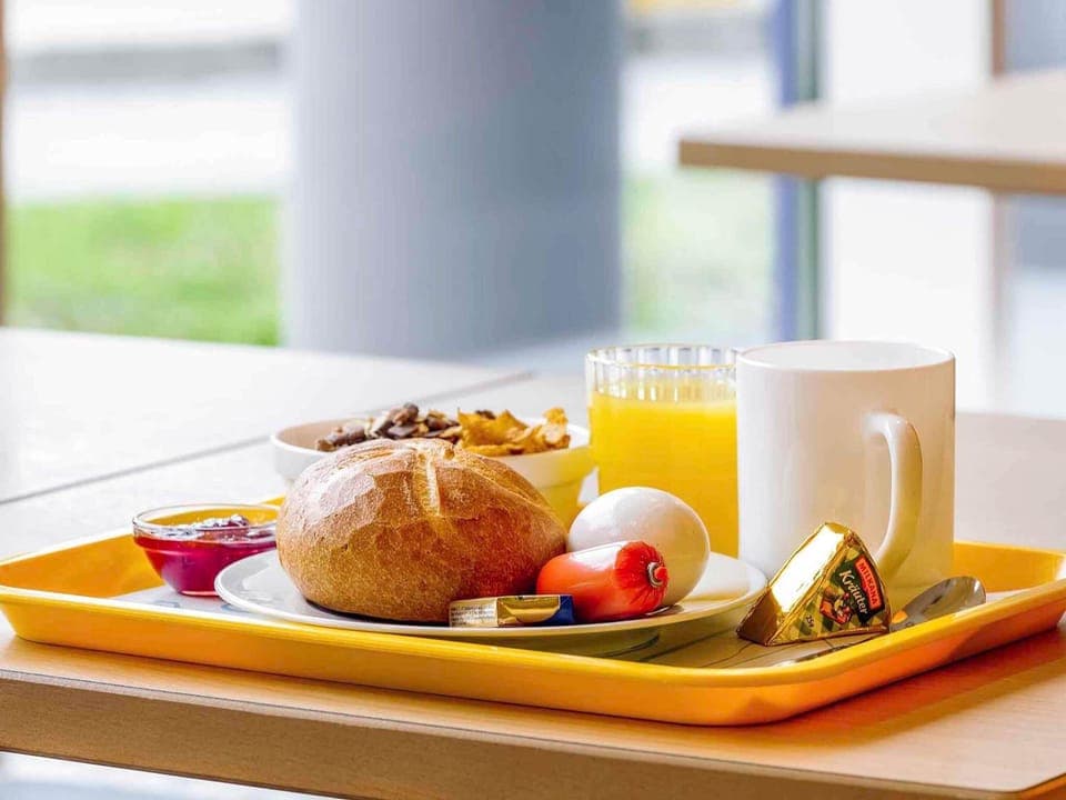 Daily buffet breakfast (EUR 12 per person)