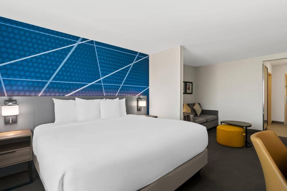 Suite, 1 King Bed with Sofa bed, Non Smoking | Desk, blackout drapes, iron/ironing board, free WiFi