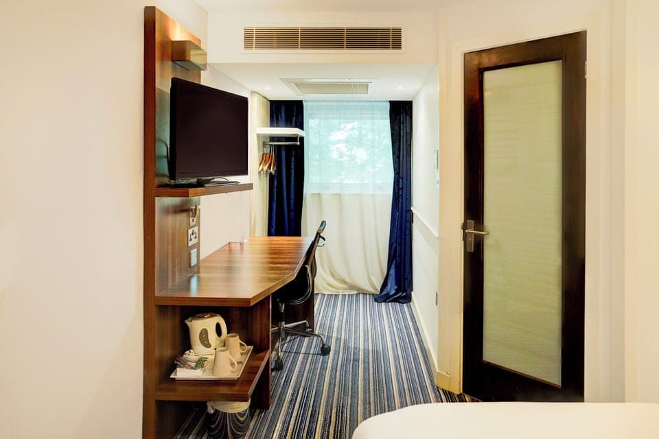 Standard Double Room | Desk, blackout drapes, iron/ironing board, free WiFi