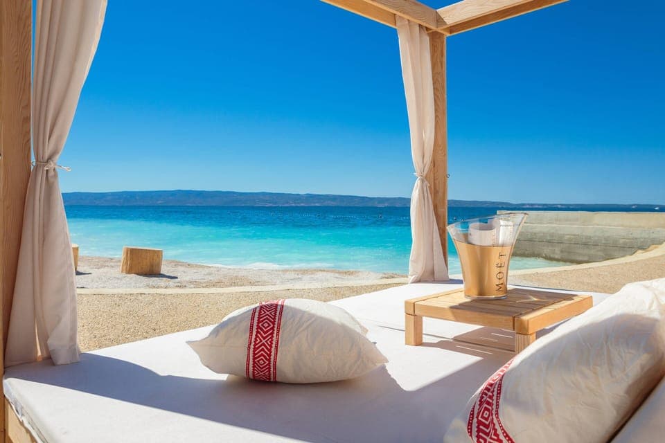 On the beach, scuba diving, snorkeling, water skiing