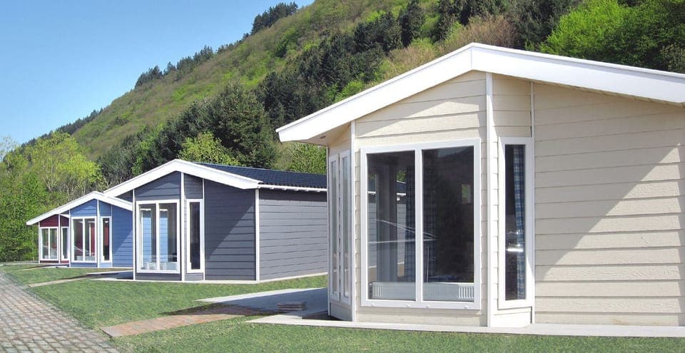 Mini Chalet, Garden Area | In-room safe, desk, rollaway beds, bed sheets