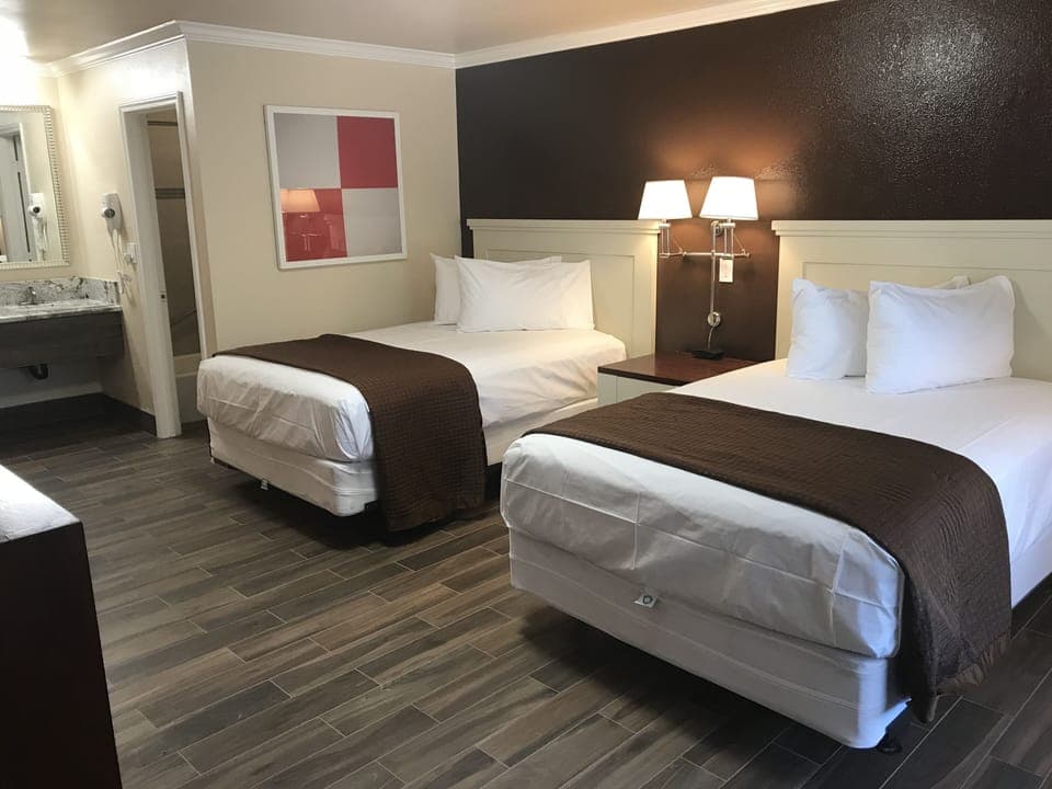 Standard Room, 2 Queen Beds | Desk, blackout drapes, iron/ironing board, rollaway beds