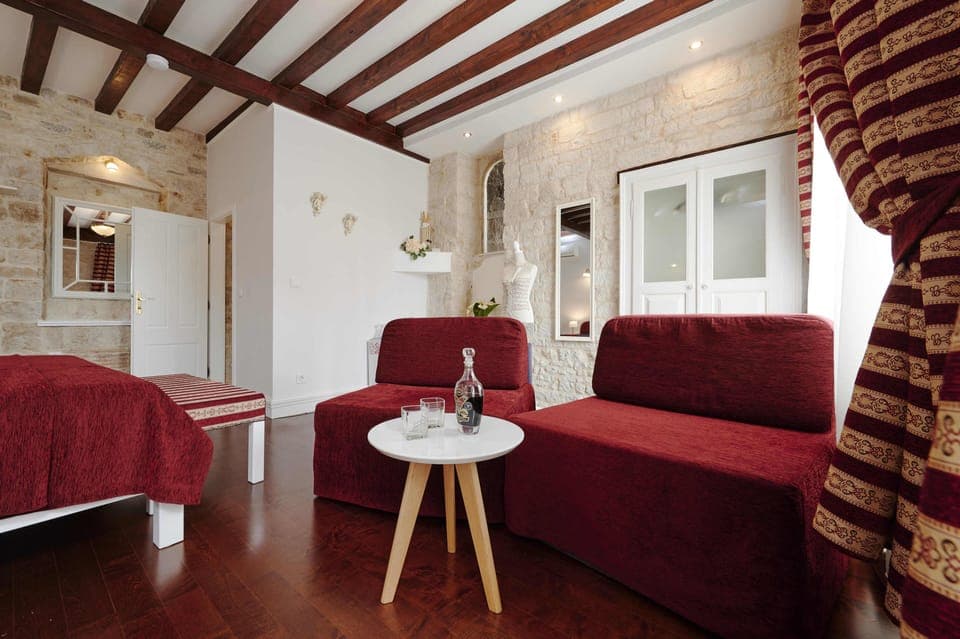 Superior Double Room, City View | Living area | Flat-screen TV