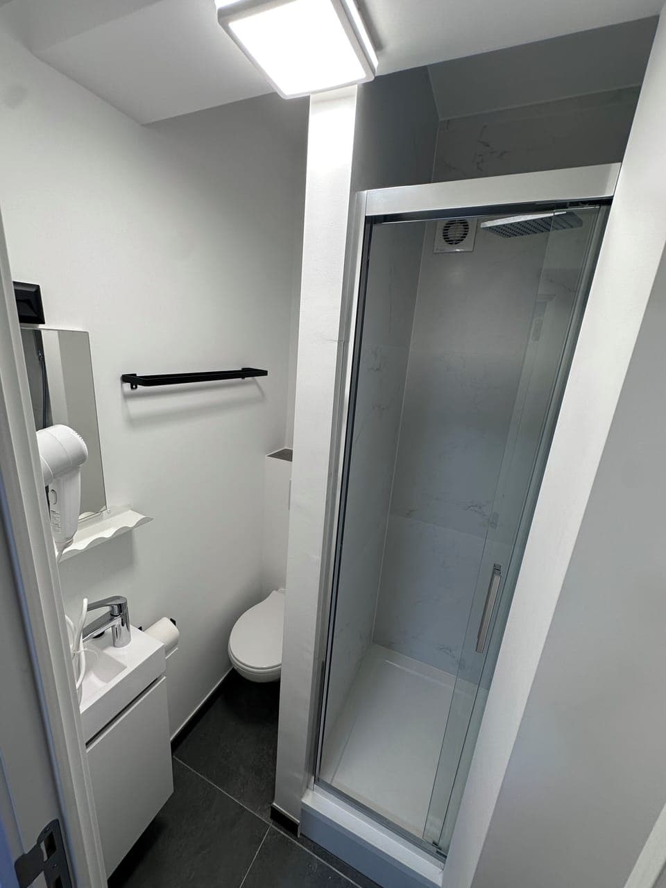 Shower, free toiletries, hair dryer, towels