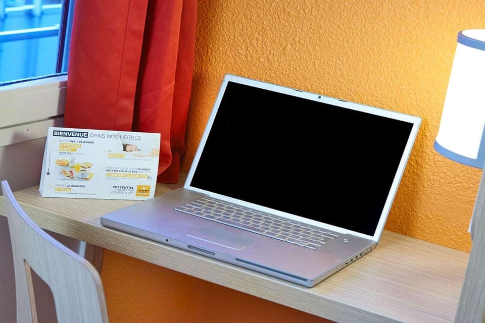 Desk, blackout drapes, iron/ironing board, free WiFi