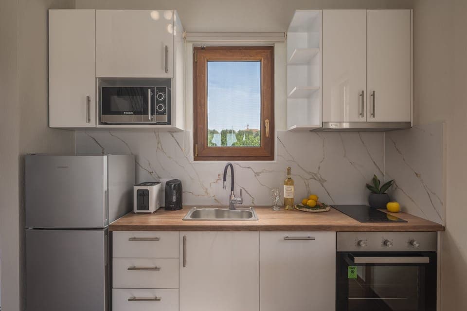 Family Villa, 2 Bedrooms, Private Pool, Pool View | Private kitchen | Full-size fridge, microwave, oven, stovetop