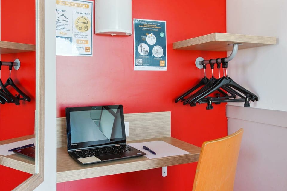 Comfort Room (accessible) | 1 bedroom, desk, blackout drapes, iron/ironing board